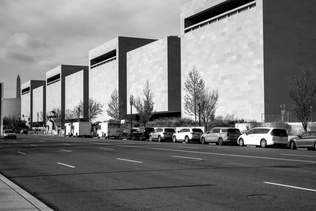 The long stone-clad blocks of the museum building seen across Independence Avenue in winter