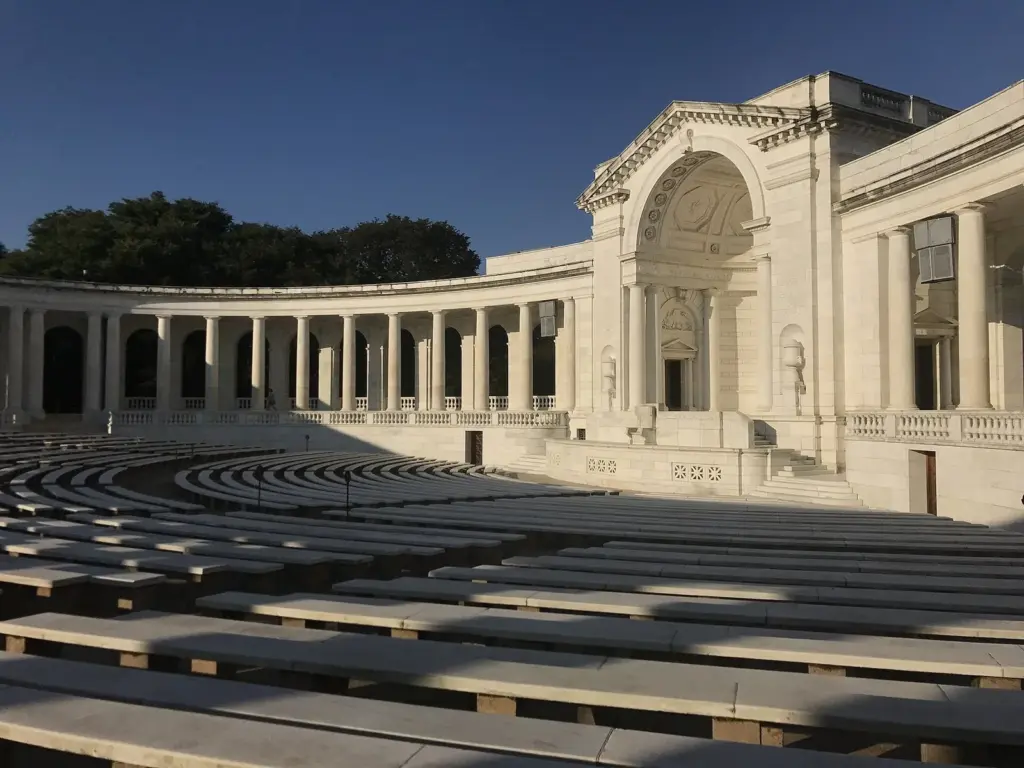Marble colonnade and curved stone seating of the Memorial Amphitheater