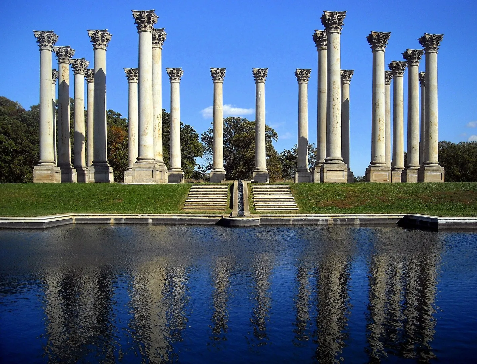 The National Capitol Columns reflected in a pool at the U.S. National Arboretum, one of the largest parks in Washington DC