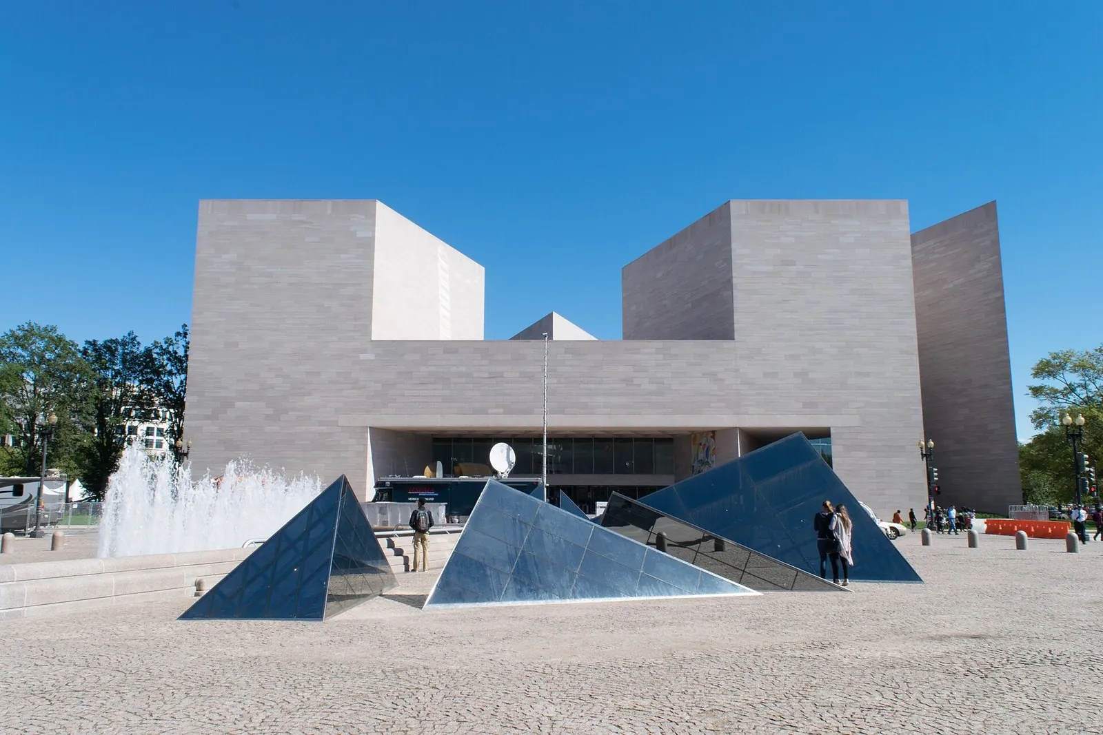 The National Gallery of Art's East Building, one of the free museums in Washington DC, with glass pyramid skylights in the plaza