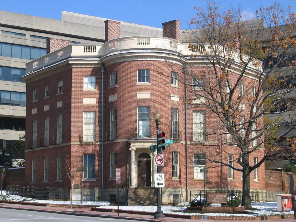The red-brick Octagon house with its rounded front bay on a Washington street corner