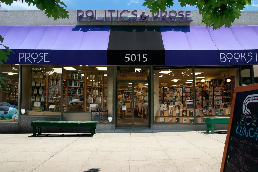 The purple awning and book-filled windows of Politics and Prose at 5015 Connecticut Avenue