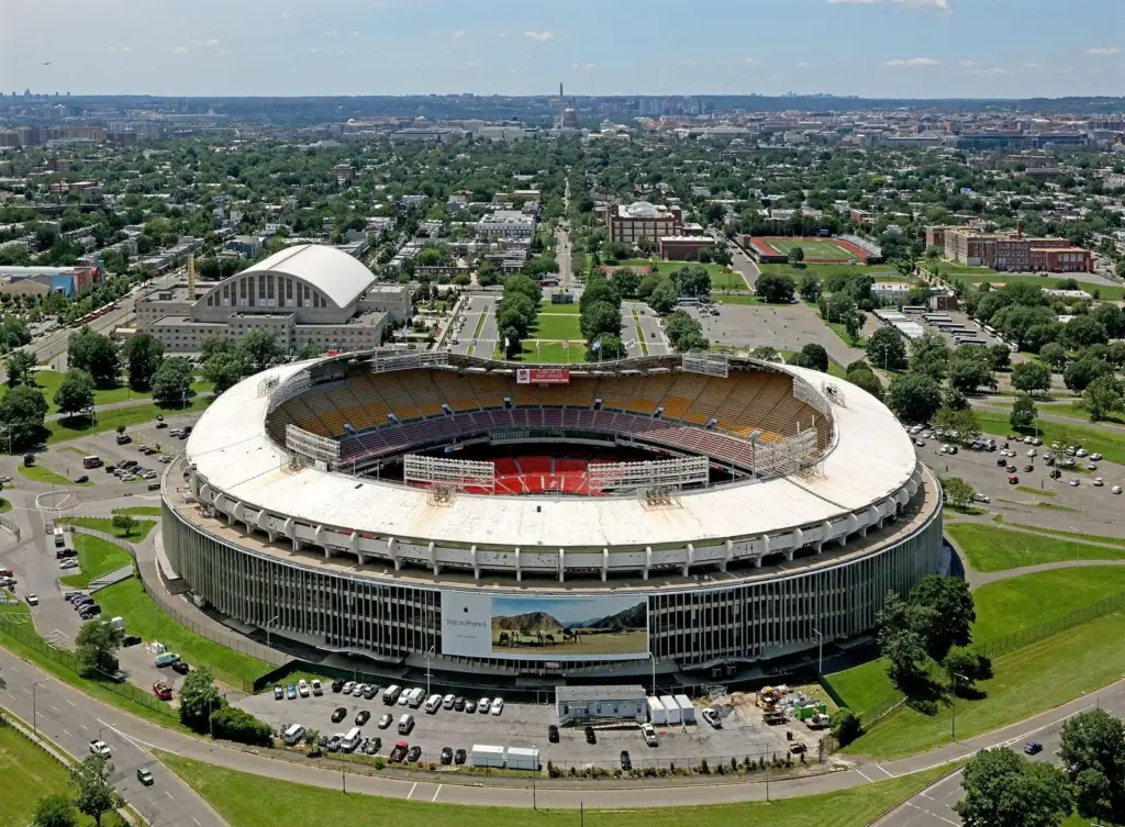 Aerial view of the empty bowl of RFK Stadium with the Capitol and National Mall in the distance