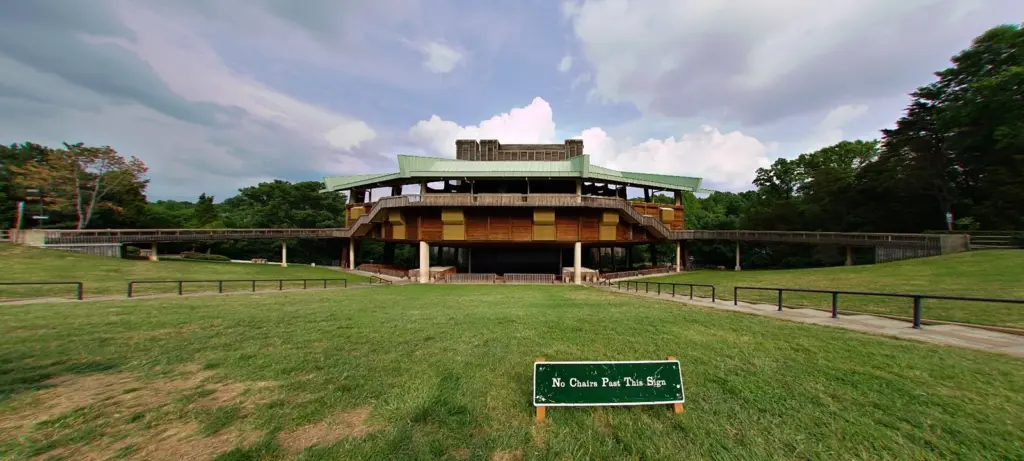The Filene Center's timber pavilion at Wolf Trap seen across its open lawn